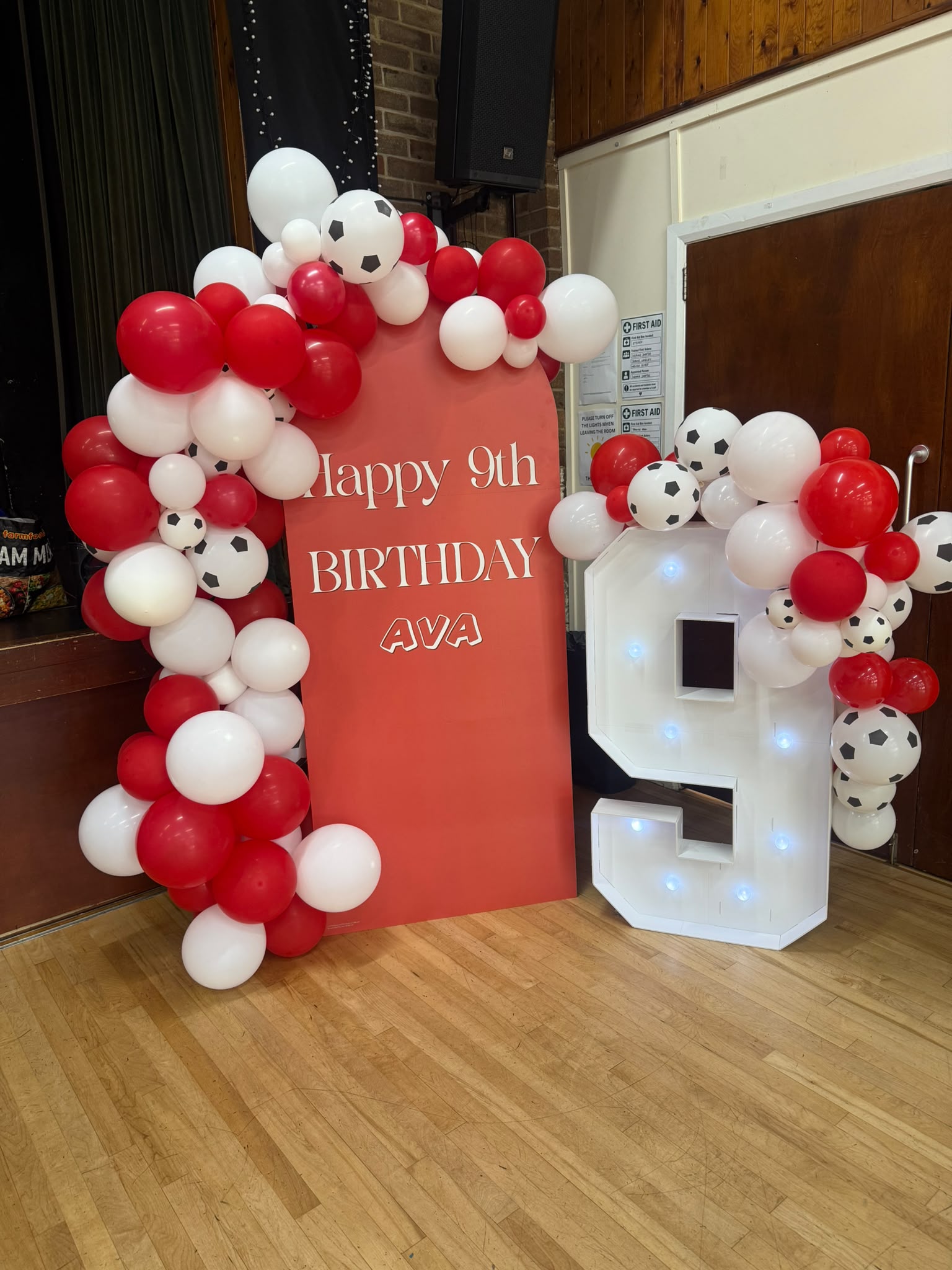 Birthday celebration styling with balloon decor, table setup and a personalised event display